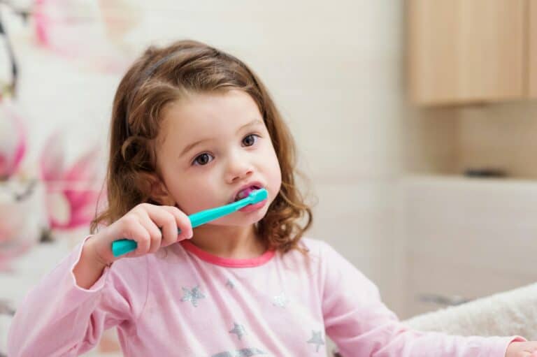 toddler brushing teeth